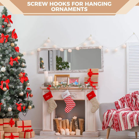 Christmas living room with tree and gifts, using Gold Cup Hooks Set With 110 Pieces In Six Sizes One Half Inch for decoration.