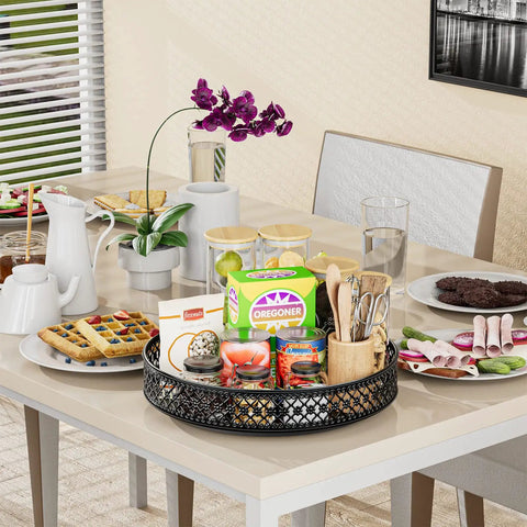 13 Inch Lazy Susan Turntable Heavy Duty Metal Spice Rack Organizer Built Tough As A Rock With A Smooth 360 Swivel Base Rust Resistant Finish For Kitchen Storage on dining table with assorted snacks.