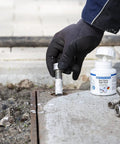 Hand applying Anti Seize High Tech Assembly Paste 450 G Metal Free High Temperature Resistant For Corrosion Protection