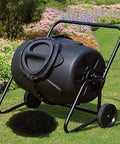 No Fuss Rollable 170L Compost Tumbler For Easy Garden Waste And Kitchen Scraps Large Outdoor Bin With Wheels in a yard