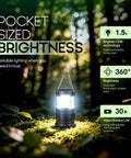 Bright 360 Degree COB LED Camping Lantern Powered by Batteries in a forest setting, providing illumination on mossy ground.