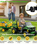 Child riding toy tractor with Universal Trailer Hitch Adapter for kids ride on toys, hauling cargo in backyard.