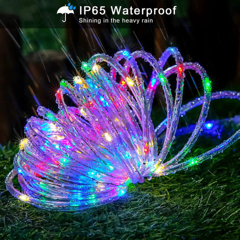 Outdoor 200 LED Solar Rope Lights, 66ft IP65 Waterproof multicolor lights on grass, suitable for trampoline and garden decor