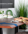Pro Grade 60 Inch Electric Standing Desk With Adjustable Height And Memory Presets Smooth Hazelnut Woodgrain Finish with beveled edge.