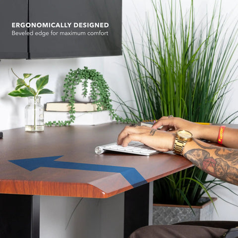 Pro Grade 60 Inch Electric Standing Desk With Adjustable Height And Memory Presets Smooth Hazelnut Woodgrain Finish with beveled edge.