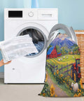 Big 24x36 Inch Drawstring Laundry Bag With Removable Mesh Wash Bag Dual Bag Set in front of washing machine with countryside design