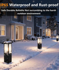Heavy Duty Outdoor Path Light 15.75 Inches Modern Landscape Bollard illuminating a snowy walkway in winter.