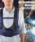 Heavy Duty Efficiency Cooling Waistcoat For Welders Provides Instant Chilled Vortex Air Flow Protection Against High Heat And Humidity In Foundries Ensures All Day Ergonomic Fit And Safety During Radiant Heat Tasks worn by a person.
