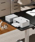 Heavy Duty Desk Extender Tray With Secure Laptop Holder And Generous Extra Surface Solid Keyboard Shelf That Seriously Levels Up Your Home Office Flex In Sleek Black with printer, papers, and headphones.
