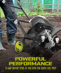 Person using Corded Electric Garden Tiller And Cultivator With 15 Amp Motor 6 Steel Tines And 15.7 Inches Tilling Width for soil prep