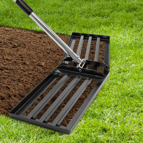 Angled Design Lawn Leveling Rake With 30 By 10 Inch Stainless Steel Head And 70 Inch Adjustable Handle on grass and soil