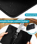 11 X 8.7 Inch Mouse Pad With Stitched Edges And Non Slip Base being washed, showcasing its waterproof and washable design.