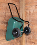 Two Wheel Garden Barrow With Rust Proof Powder Coated Frame Black Loop Handle Cart image on wooden wall