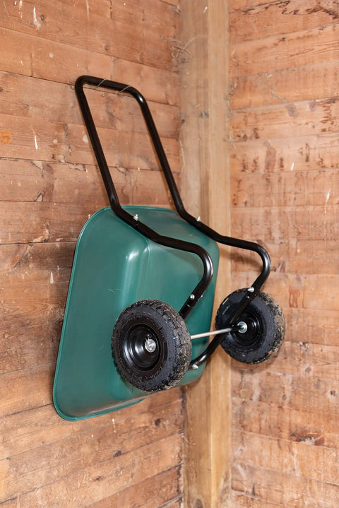 Two Wheel Garden Barrow With Rust Proof Powder Coated Frame Black Loop Handle Cart image on wooden wall