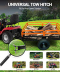 Heavy Duty 1500 Lb Tow Behind Dump Cart For ATVs And UTVs, attached to a lawn tractor, showcasing universal hitch and orange design.