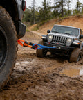 Off-road Jeep using UHMWPE Soft Shackle Two Pack With Space Aluminum Recovery Ring for recovery in muddy terrain