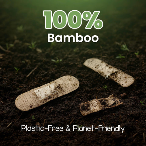 Patch bamboo adhesive bandages on soil, close-up view; 100% Bamboo text, plastic-free concept.