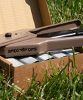 Auto Feed Hog Ring Plier 16-Gauge in a box on grass, showing spring loaded magazine and 50 ring capacity