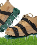 Green Heavy Duty Lawn Aerator Shoes With Spikes And Straps, One Size Fits All Men And Women, on brown boots over grass