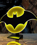 Batman Night Light Table Lamp With 3D Halo Glow, Mountable Bat Sign Wall Light on pedestal, illuminated bat emblem with yellow glow
