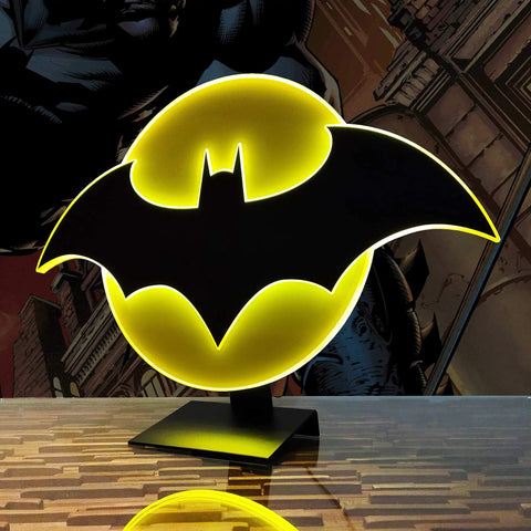 Batman Night Light Table Lamp With 3D Halo Glow, Mountable Bat Sign Wall Light on pedestal, illuminated bat emblem with yellow glow