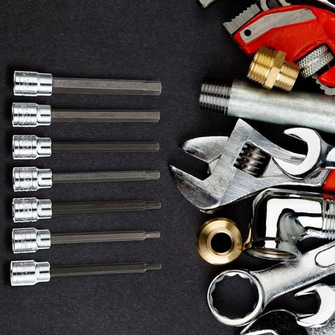 3 8 Inch Drive Badass Xxl Extra Long Bits Socket Wrench Set showing heavy-duty ratcheting tools and chrome sockets in a workshop setup.