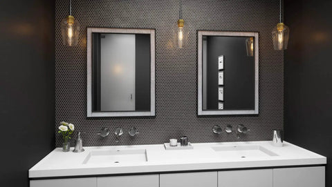 Two Sagamore Mini Pendant Ceiling Lights In Earth Black With Brass Accents over modern double sink bathroom vanity.