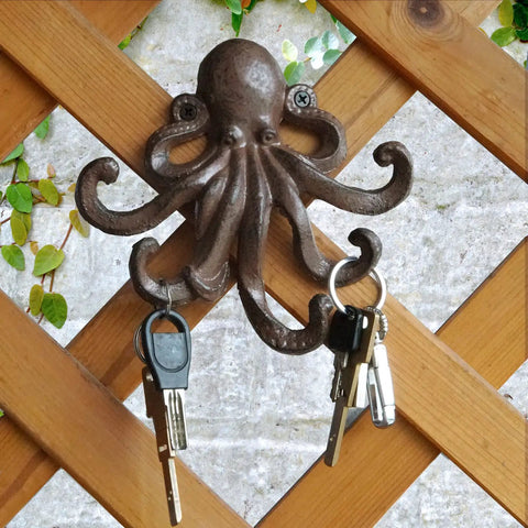Heavy Duty Cast Iron Octopus Wall Hooks With Sleek Nautical Vibes And Aged Dark Brown Finish For Hanging Coats Keys Towels And Gear Built Like A Tank With Real Antique Charm That Truly Pops, displaying keys.