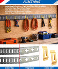Heavy Duty E Track J Hooks Tie Down Set holding tools and cables on a workshop wall with E-Track rails installed