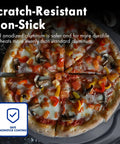 Freshly baked pizza on a perforated 12 inch metal pizza peel with long handle non stick aluminum paddle for outdoor ovens