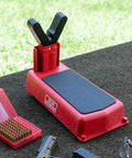 Pistol Sighting In Rest For Handguns, Adjustable Bench Rest with 20 Position Base and Over Molded Rubber Fork Coating on a table