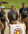 Three men standing with a Two Sided Archery Target Bag With 50 Bullseyes For Practice And Range, outdoors.