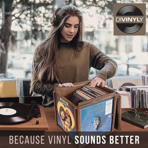 Rotating Vinyl Record Storage Box 4 In 1 Wooden Display Cube for 100 LP Records shown with person selecting records.