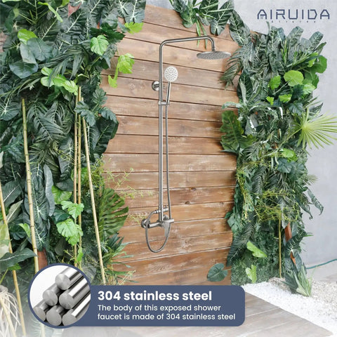 Outdoor Shower Faucet Setup With SUS304 Stainless Steel Wall Mount Exposed Brushed Nickel Finish Single Handle 8 Inch Rainfall Showerhead And Handheld Spray Dual Function against wooden backdrop and greenery.