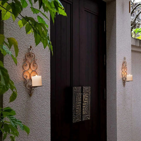 Realistic 3 Inch Flameless Candles Set of 2 With Remote Flicker in wall sconces at outdoor entrance