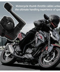 Motorcycle rider with Seven Eighths Inch Thumb Throttle Kit with Throttle Cable for Aluminum Motorcycle and Mini Bike in the foreground