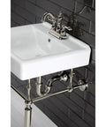 Heritage 4 Inch Centerset Lavatory Faucet With Metal Lever Handle In Polished Nickel on wall-mounted white sink