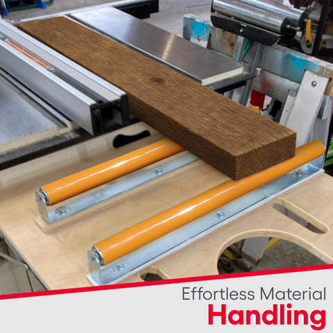 Two orange polyurethane-coated conveyor rollers with metal brackets in a frame; wood block resting on top.
