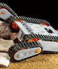 Arm Crawler Tool Set No 211 70211 with extendable arm navigating rocky terrain