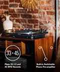 Audio Technica At-Lp70x Fully Automatic Belt Drive Turntable With Switchable Phono Preamp And At-Vm95c Cartridge on a wooden shelf.