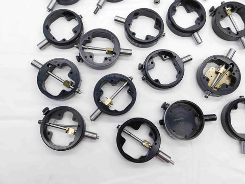 Assorted Dial Test Indicator Spare Parts Bundle Plug And Play For Precision Machine Repair featuring dials and gears on a workbench.