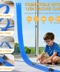 Boy playing with Flexible 16Ft Race Track Set With Roll Up Storage And Six Diecast Cars For One Sixty Four Scale Play Setup Is A Breeze And Unfolds In Seconds Suction Cups And Hooks For Smooth Surfaces Ideal For Kids Aged 3 Plus.