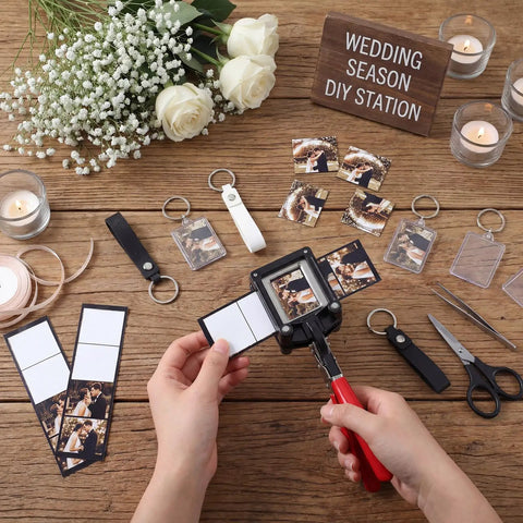 61 Piece Handheld Keychain Making Kit with 1.38x1.77 Inch Square Cutter and DIY photo inserts on a wooden table with wedding supplies
