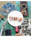 Pro Grade Solder Wick Desoldering Copper Wire Braid 8M Long For PCB BGA Cleanup in use on various circuit boards.