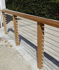 Cable Railing Kit For Indoor And Outdoor Use With Adjustable Tightness Made From Pro Grade Stainless Steel installed on a deck