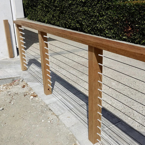 Cable Railing Kit For Indoor And Outdoor Use With Adjustable Tightness Made From Pro Grade Stainless Steel installed on a deck