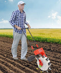 Person using 10 Beak Manual Seed Seeder For Peanut Corn And Beans, Precision Handheld Planter With 2.95 Inch Depth on farmland