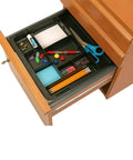 Slick Expandable Drawer Organizer Tray With Adjustable Width And Removable Dividers For Hustle Ready Desk Organization In Smooth Recycled Black Plastic Finish in a desk drawer filled with supplies.