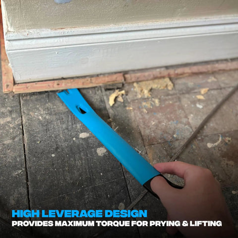 21 Inch Flat Pry Bar With Heat Treated Forged Steel Construction And Powder Coated Finish in use for prying a baseboard