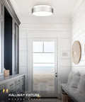 12 Inch Flush Mount Ceiling Light Fixture With Frosted Glass Shade In Brushed Nickel Finish in modern hallway setting